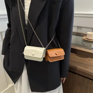 Mini rectangular crossbody bag with chain strap in cream and brown PU leather