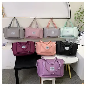 Multiple colors of large capacity travel bags made of waterproof nylon fabric