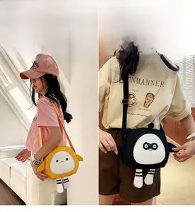 Detail of cute cartoon canvas crossbody bag with striped decorative legs for girls