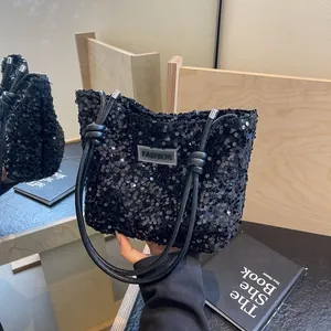 Large capacity black sequin tote bag with knot leather handles and fashion label