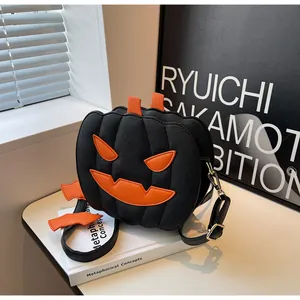Detail of Jack-o'-lantern pumpkin bag showing black faux leather and orange stitching