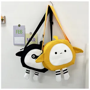 Detail of cute yellow and black canvas crossbody bags with long adjustable straps