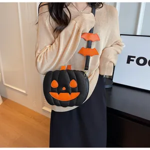Creative pumpkin shoulder bag in orange and black with bat strap for Halloween