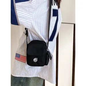 Outdoor minimalist nylon crossbody bag for men and women with adjustable shoulder strap