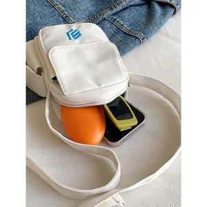 Mini white nylon crossbody bag for outdoor hiking with blue embroidery logo