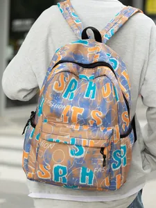 Mochila de gran capacidad para estudiantes con estampado de grafiti y diseño de letras camo