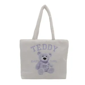 White plush tote bag with cute purple teddy bear print and Teddy Baby Girl text design