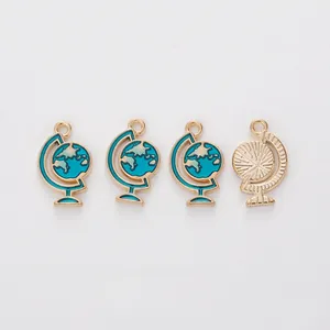 Blue and gold globe charms made of alloy enamel for DIY jewelry making and crafts