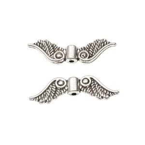 Pair of vintage silver alloy wing spacer beads for DIY jewelry making and crafts