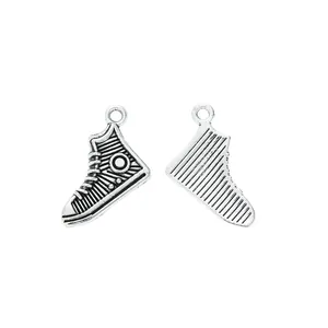 Pair of vintage zinc alloy high-top sneaker charms in antique silver for DIY jewelry crafts