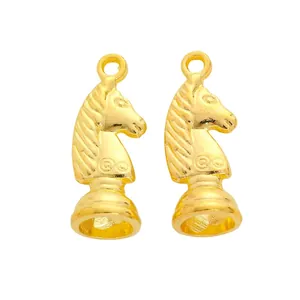 Pair of golden vintage alloy chess knight pendants for DIY jewelry making and crafts