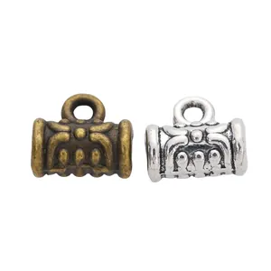 Vintage legering kralen met reliëfpatronen in brons en zilveren afwerkingen