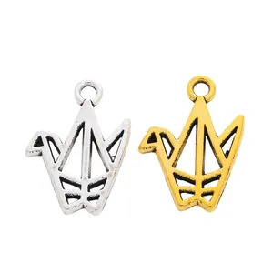 Vintage hollow crane charms in silver and gold alloy finish for DIY jewelry crafting