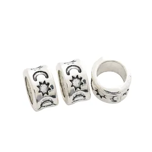 Détail de perles de charme rétro en alliage d'argent avec motifs soleil et lune