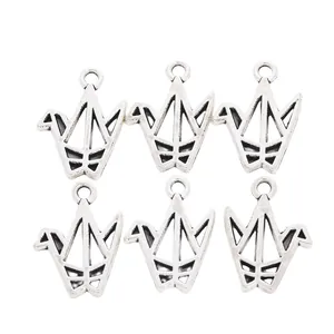 Set of six vintage antique silver paper crane hollow charms for DIY jewelry making