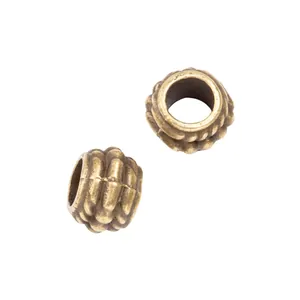 Retro bronzen legering afstandskralen met geribbelde textuur voor DIY sieraden maken