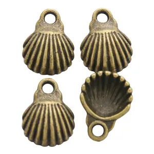 Vintage bronze shell charms in zinc alloy for DIY jewelry making and craft projects