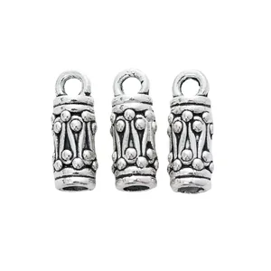 Three vintage silver cylinder charms with geometric patterns for DIY jewelry making