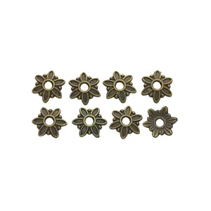 Set de 8 capuchones de flores en bronce vintage con seis pétalos para joyería DIY
