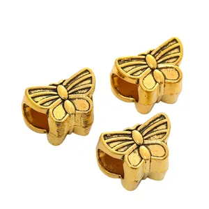 Set van drie antieke gouden vlinderbedels voor DIY Europese armbanden en sieraden