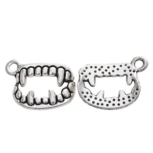 Vintage silver vampire teeth alloy charms for DIY necklaces with detailed antique finish