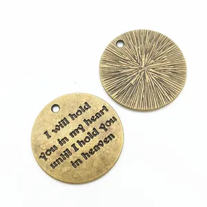Vintage bronze round charms with 'I will hold you in my heart' memorial engraving