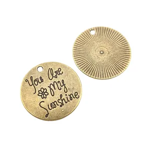 Vintage μπρούτζινα μενταγιόν με χάραξη You Are My Sunshine και σχέδιο ηλιαχτίδας
