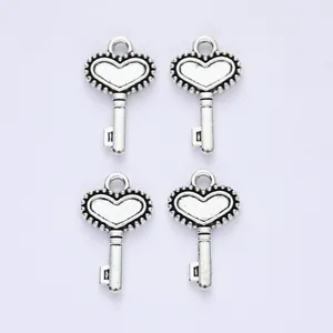 Set of 4 vintage silver heart key pendants with embossed texture for DIY jewelry making