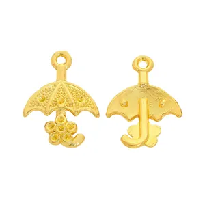 Vintage gold zinc alloy umbrella pendants for DIY jewelry making showing front and back