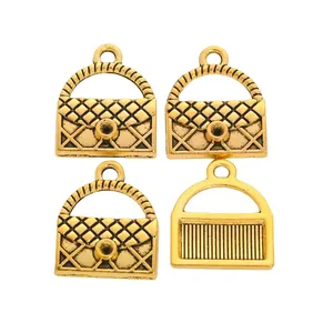 Set of 4 vintage gold alloy handbag charms for DIY jewelry making and bag accessories
