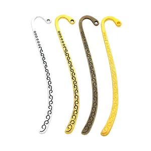 Ganci per segnalibri in lega di zinco oro e argento con motivi a volute in rilievo
