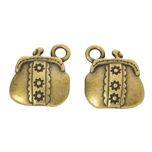 Retro zinc alloy coin purse charms in antique bronze finish with daisy floral engraving