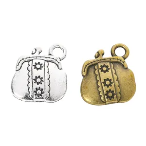 Vintage flower engraved wallet charms in silver and bronze finishes for DIY jewelry