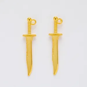 Pair of vintage gold zinc alloy dagger sword pendants for DIY jewelry making and crafts
