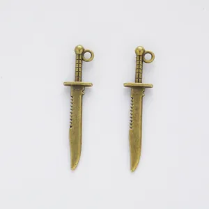 Pair of vintage bronze alloy dagger pendants for DIY jewelry making and crafts