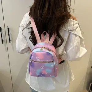Detailed back view of a mini galaxy backpack with purple starry pattern and star motifs
