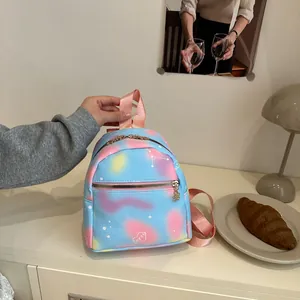 Mini pink and blue gradient backpack with love heart pattern and star celestial design