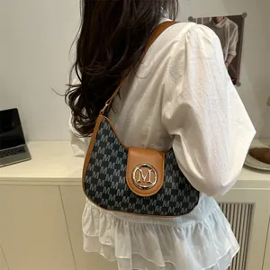 Retro shoulder bag in grey canvas with letter print and brown leather accents