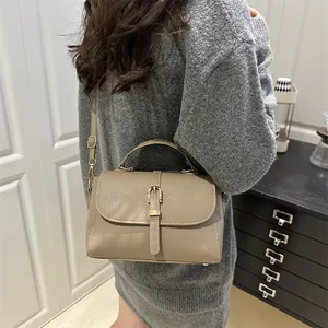 Litchi pattern crossbody bag in khaki with gold hardware and adjustable strap