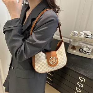 Retro underarm bag with caramel leather trim and monogram print for women
