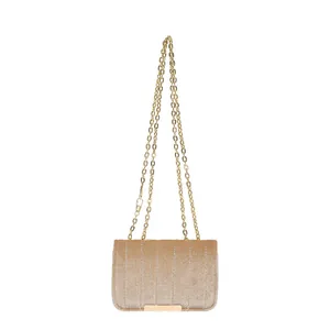 Champagne gold velvet crossbody chain bag with vertical quilting and metallic trim