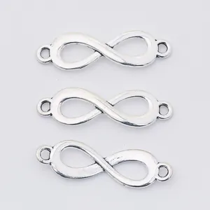 Three vintage silver alloy infinity symbol connectors for DIY jewelry making and crafts