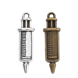 Vintage alloy syringe pendants in antique silver and bronze for DIY jewelry crafting