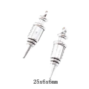 Macro shot of 25x6x6mm antique silver syringe charms for DIY jewelry making