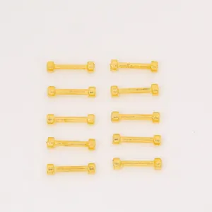 Set of ten gold vintage zinc alloy barbell charms for jewelry making and DIY crafts