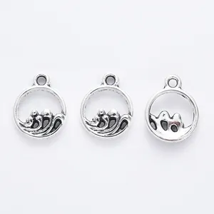 Three vintage silver ocean wave circle pendants for DIY jewelry making crafts
