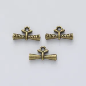 Three pieces of vintage bronze graduation scroll charms for DIY jewelry making