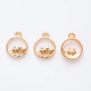 Three golden alloy circular ocean wave pendants for DIY jewelry making necklace crafts
