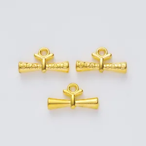 Three pieces of golden metal scroll charms with GRADUATE engraving for DIY jewelry