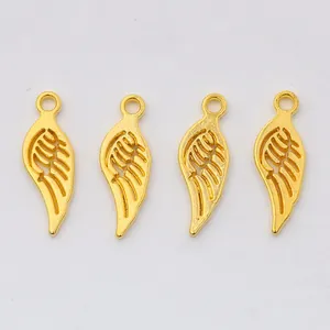 Set of four gold-plated zinc alloy wing pendants for DIY vintage jewelry making